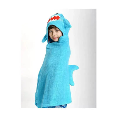 A child wearing a blue hooded towel designed as a shark, featuring a playful face and fin.