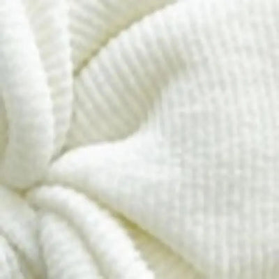 Close-up of ivory ribbed fabric from Baby Bling Bows baby fabric clips.