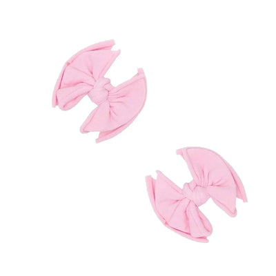 Two pink fabric hair bow clips by Baby Bling Bows