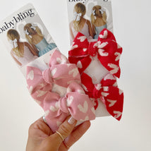 2PK BABY BLOOM CLIPS: knit pink heart