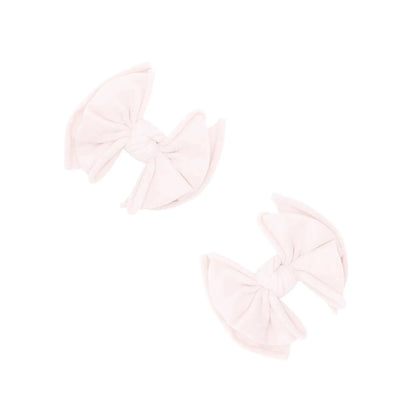 Two ballet pink fabric hair bow clips by Baby Bling Bows on a white background